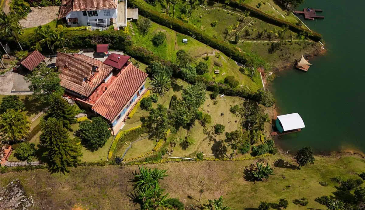 Lush green garden with mountain backdrop