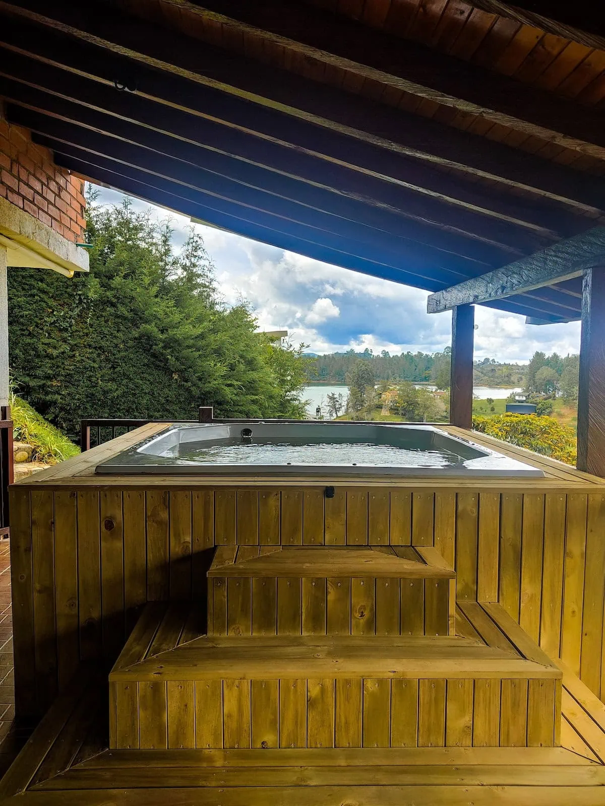 Heated jacuzzi with panoramic view of El Peñol at Finca Conejo Blanco